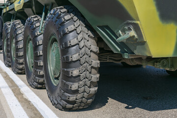 Wheels of armored vehicles close-up while parked