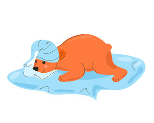A bear in a cap lies on a blanket.