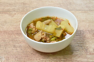 spicy boiled winter melon and eggplant with chicken soup in bowl