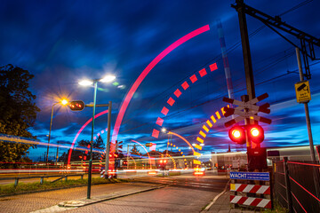 Railroad crossing at night