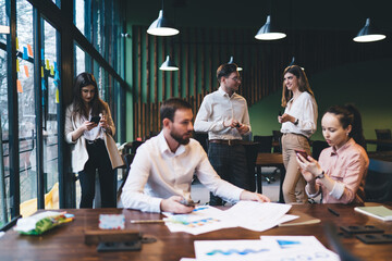 Business people discussing project in office