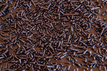 Chocolate brigadeiro background texture. Top view.