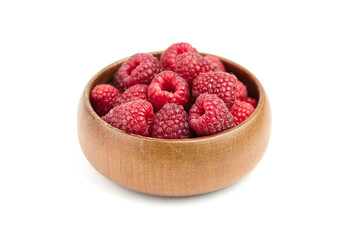 Fresh raspberries in wooden bowl isolated on white background. Red sweet raspberries