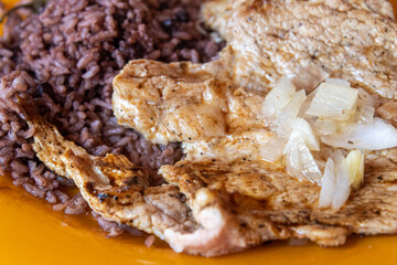 Traditional Cuban food. Pork Steak with Congri Rice