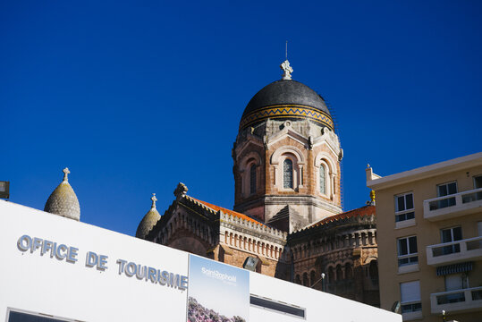 SAINT RAPHAEL,FRANCE - MAY 31,2019: view of the tourism office and the church of Basilique Notre-Dame de la Victoire photograped on a sunny day