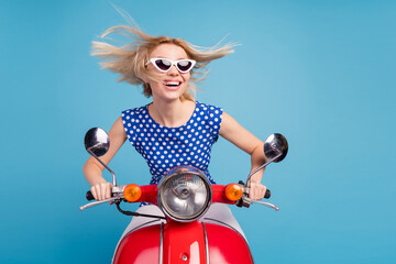 Photo of young cheerful girl happy positive smile ride motorbike transport travel fly hair isolated...