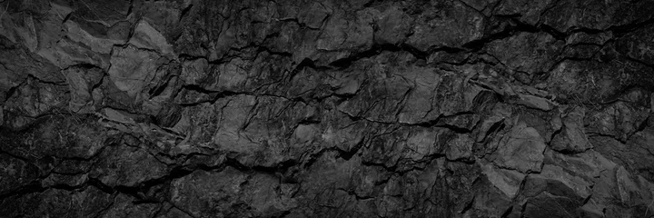 Gordijnen Volumetrische rotstextuur met scheuren. Zwarte stenen achtergrond met kopie ruimte voor design. Breed spandoek. © Наталья Босяк