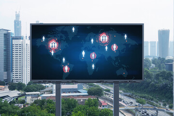 World planet Earth map hologram on billboard over panorama city view of Kuala Lumpur, Malaysia, Asia. The concept of international connections and business.