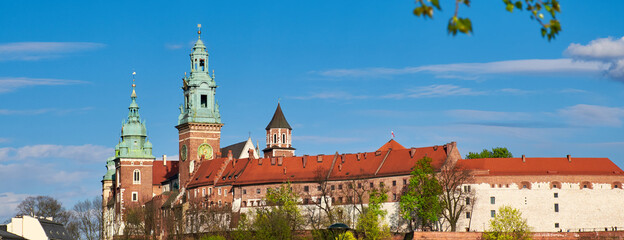 Fototapeta na wymiar Riverside of Krakow City in Poland with Wawel castle view from across the river Vistula