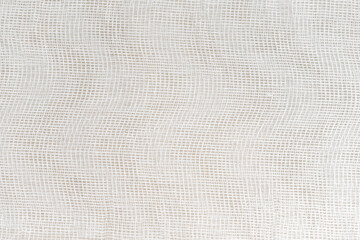 Fototapeta na wymiar Background Texture of white medical bandage. cheesecloth texture