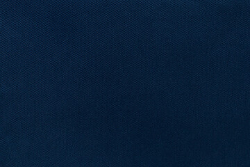 Texture of natural blue twill fabric close-up. background for your mockup