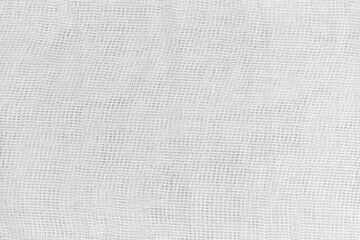 Fototapeta na wymiar Background Texture of white medical bandage. cheesecloth texture