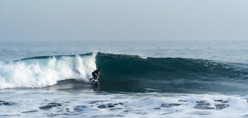 Surfing in Puertecillo, chilean west coast