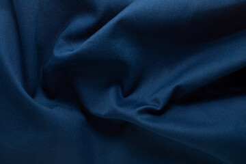 Texture of wrinkled, crumpled natural blue fabric close-up. background for your mockup