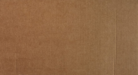 Fototapeta na wymiar dark brown corrugated cardboard texture background