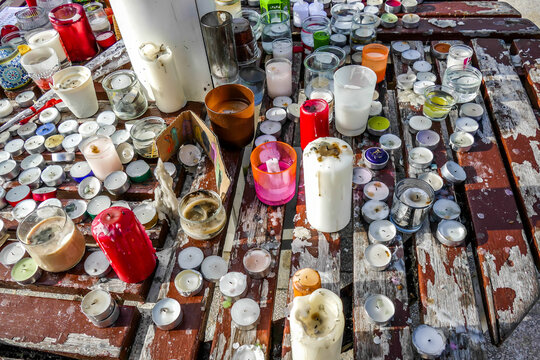 Flowers And Candles Left, After The Vigil And Prayer.