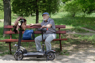 A positive, elderly man went for a walk to the park, stopped and sat down to rest on a bench next...