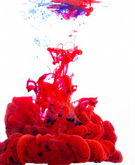 splash of blue and red paint on a white background