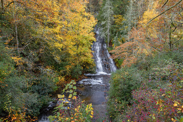Beautiful autumn landscape shot of Connestee Falls and Carson Creek