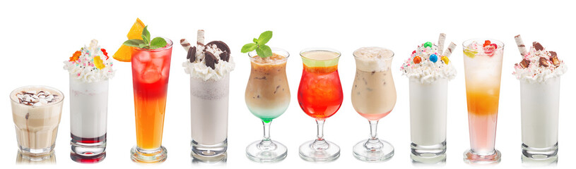 Colorful cocktails or mocktails and sweet milkshakes topped w marshmellow and jelly candies isolated