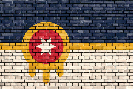 flag of Tulsa, Oklahoma painted on brick wall