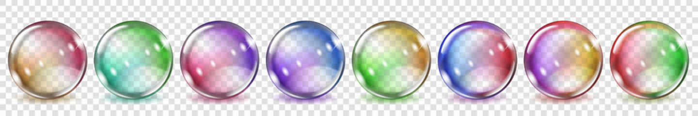 Naklejka premium Set of translucent colored spheres with glares and shadows on transparent background. Transparency only in vector format
