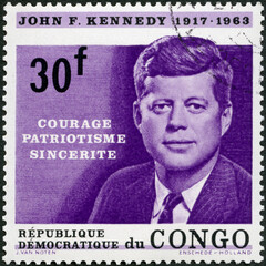 CONGO - 1964: shows Portrait of John Fitzgerald Kennedy (1917-1963), 35th president of the United States, 1964 - obrazy, fototapety, plakaty