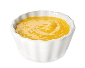 Bowl with delicious lemon curd isolated on white