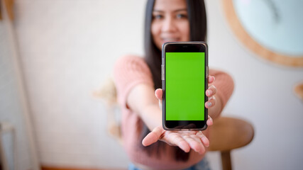 Asian girl with green screen phone
