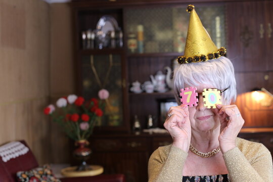 Senior woman reaching 70 years of age  - Powered by Adobe