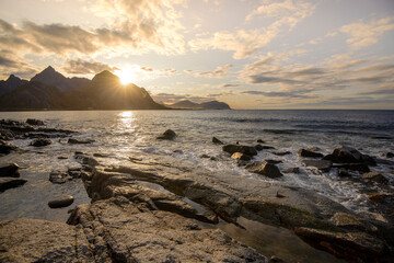 Beautiful view of mountains and beach in Lofoten Islands at sunset