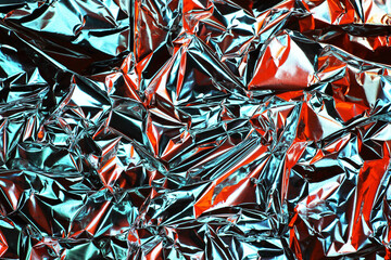 Foil background. Crumpled foil. Abstract background. Wallpaper. Red and blue