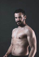 Fototapeta na wymiar adult boxer posing in a photo studio