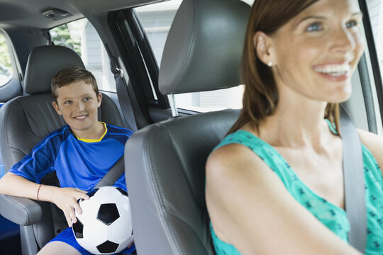 Mother Driving Son To Soccer Practice