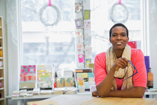 Portrait of female small business owner in store