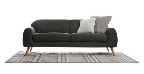 Obraz premium Comfortable grey sofa with cushions and carpet on white background. Furniture for living room interior