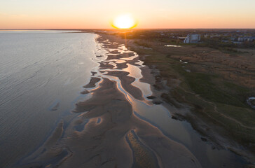 Scenic aerial view to the low tide seacoast with the natural patterns of the sand bars in urba Pärnu area, Estonia