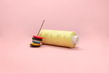 Sewing accessories threads, needles, and buttons for clothes. Sewing training. Self-development and hobbies. 