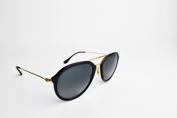 Retro aviator sunglasses isolated. Cool sunglasses with black plastic frame isolated on white...