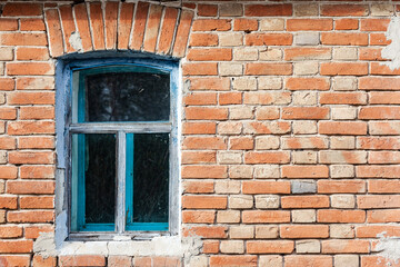 wall of old brick with laid windows, vintage background