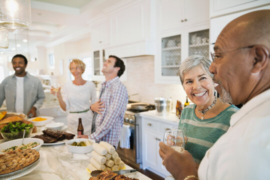 Happy Multi-ethnic Family And Friends At House Party