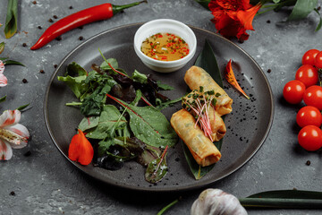 Spring rolls with shrimp with sweet chili sauce. Asian cuisine