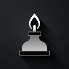 Silver Alcohol or spirit burner icon isolated on black background. Chemical equipment. Long shadow style. Vector