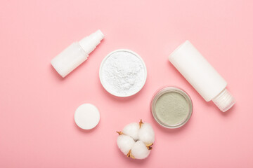 Alginate and clay face masks. Cosmetic products, masks and creams in jars. Top view, flat lay