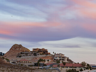 Fototapeta premium Beautiful afterglow, clouds and some residence building at Henderson