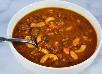 a bowl of chili macaroni