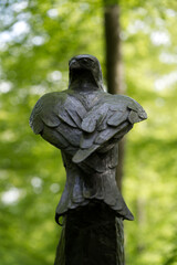 Iron eagle sculpture in the woods at City of Zurich. Photo taken May 18th, 2021, Zurich, Switzerland.
