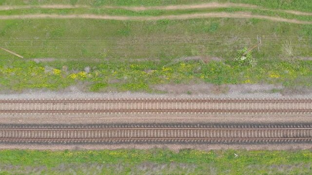 Railroad aerial top view empty drone view right side camera movement