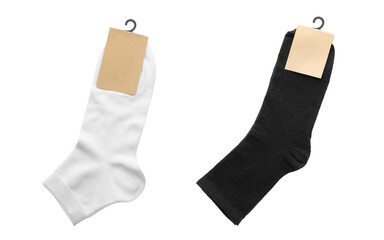 Pairs of cotton socks with blank labels on white background, collage