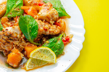 Chicken Jambalaya, cooked chicken breast pieces, in a spiced tomato sauce with chorizo, wholegrain rice, baby spinach, diced butternut squash and sliced red peppers